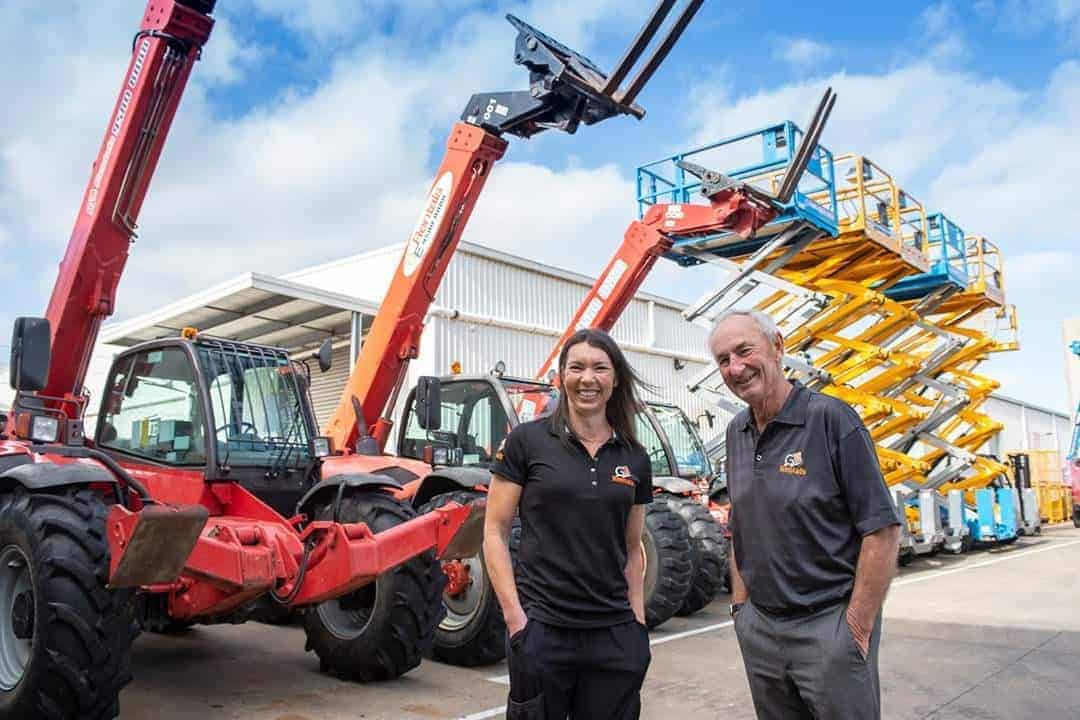 Melbourne Scissor Lift Owners in front of lifting equipment